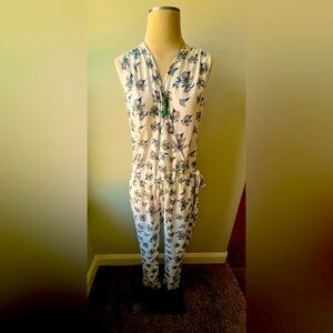 Brand New floral jumpsuit with elastic waist band comes in various sizes.